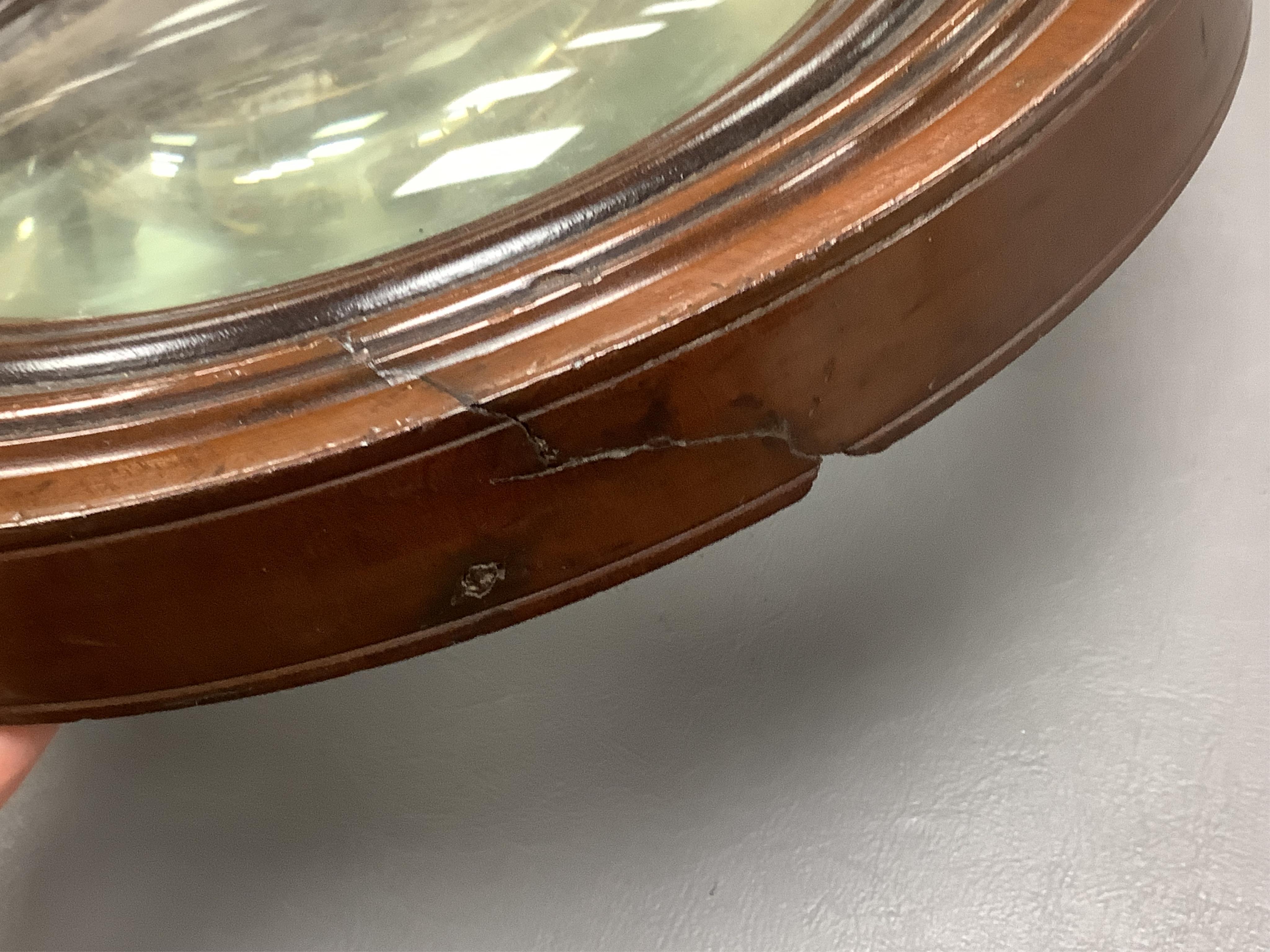 A large oversized 19th century fruitwood magnifying glass, 50cm in length